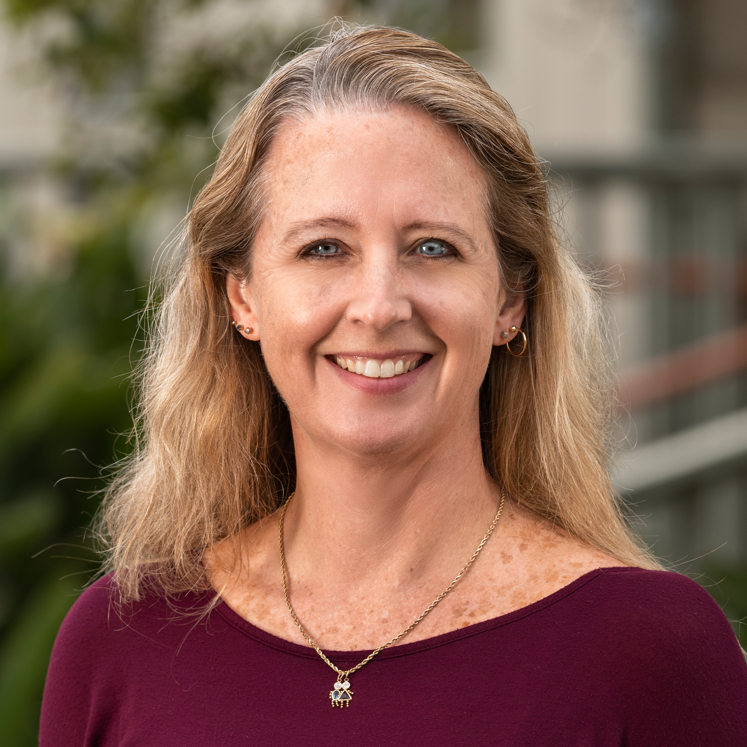 A head shot taken outside of Jennifer Pierce. 