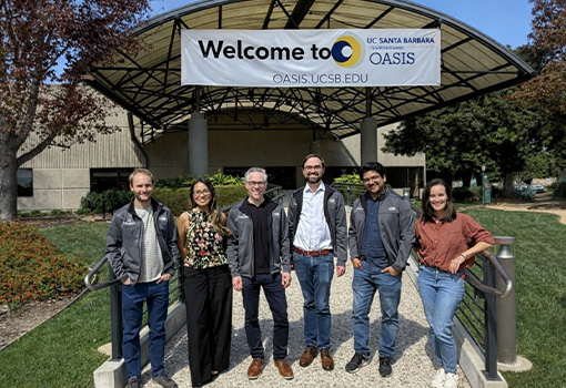 A photo of the Beacon Photonics team taken outside of the OASIS facility. 