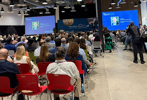 A picture of the large crowd seated inside the OASIS facility in Goleta during the 2026 TechTopia event. 